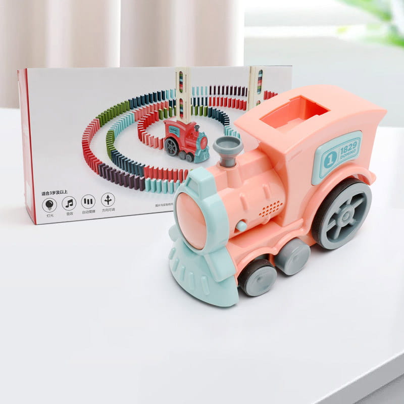 Domino train toy automatic electric building blocks set featuring a pastel pink and light blue plastic toy train with gray wheels.