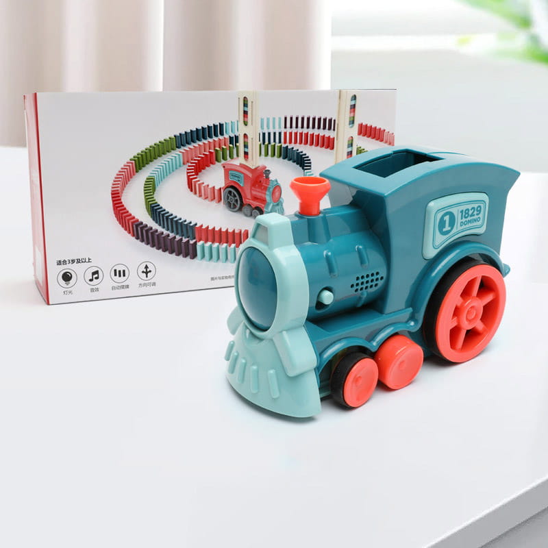 Teal and coral plastic domino train toy with red wheels featuring a domino track design on its side from the automatic electric building blocks set.