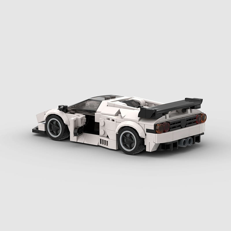 White Lego Technic sports car model Diablo GT with black wheels, spoiler, and accents built from building blocks.