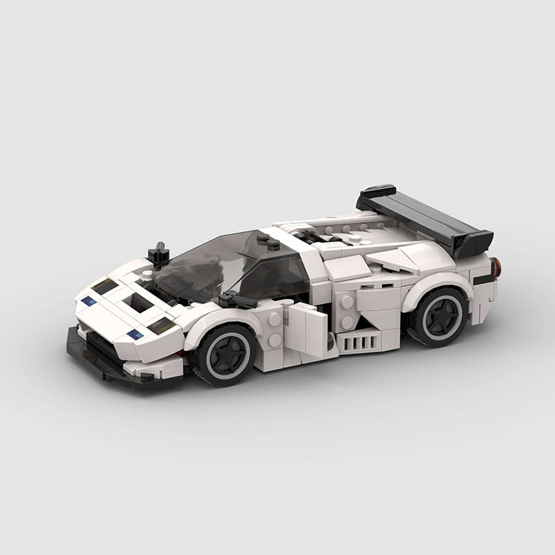 White and black lego technic sports car model diablo gt building blocks featuring a sleek aerodynamic design made of durable plastic components.