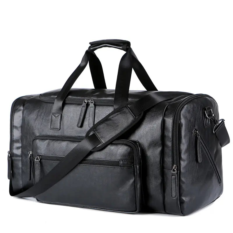 Black leather PU leather travel duffel bag for men with multiple zippers and a detachable shoulder strap 20-35 liter capacity.