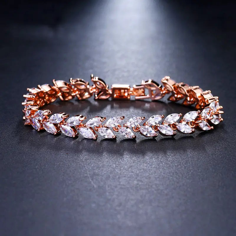 Rose gold marquise zircon leaf tennis bracelet featuring clear marquise-cut crystals in a continuous leaf-like pattern.