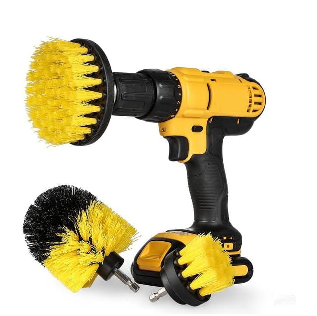 Yellow and black cordless drill with three interchangeable brush attachments for kitchen and car cleaning in a drill brush attachment set.