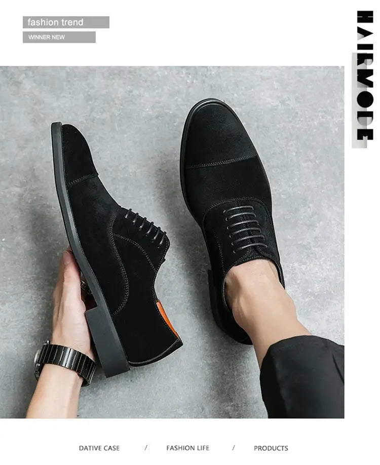 Modern suede business casual oxford shoes in black suede with cap toe lace-up design and stitched detailing.