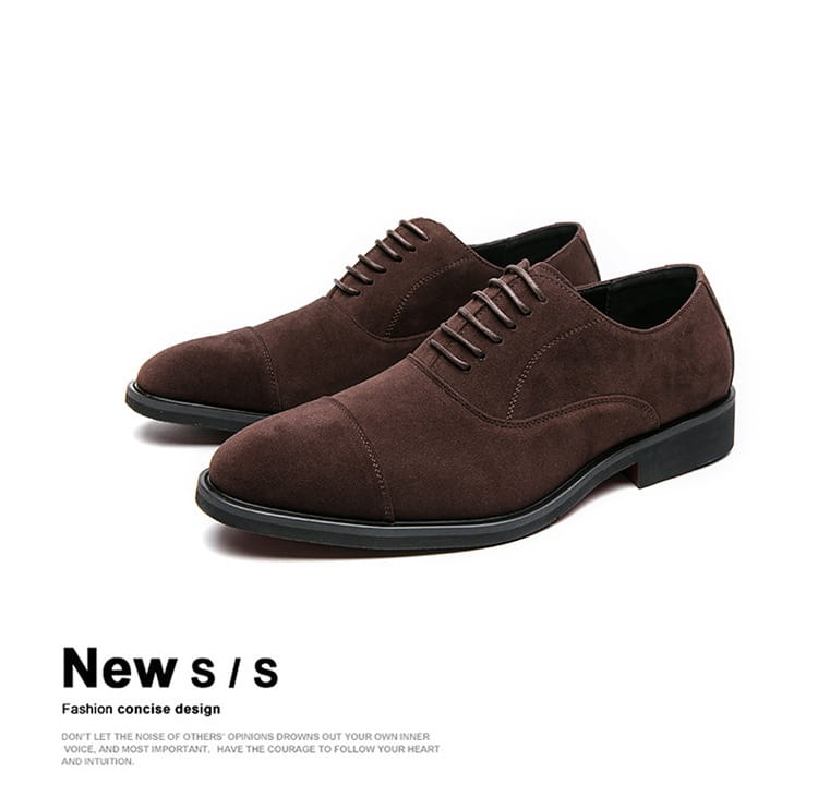 Modern suede business casual oxford shoes in black suede with cap toe lace-up design and stitched detailing.