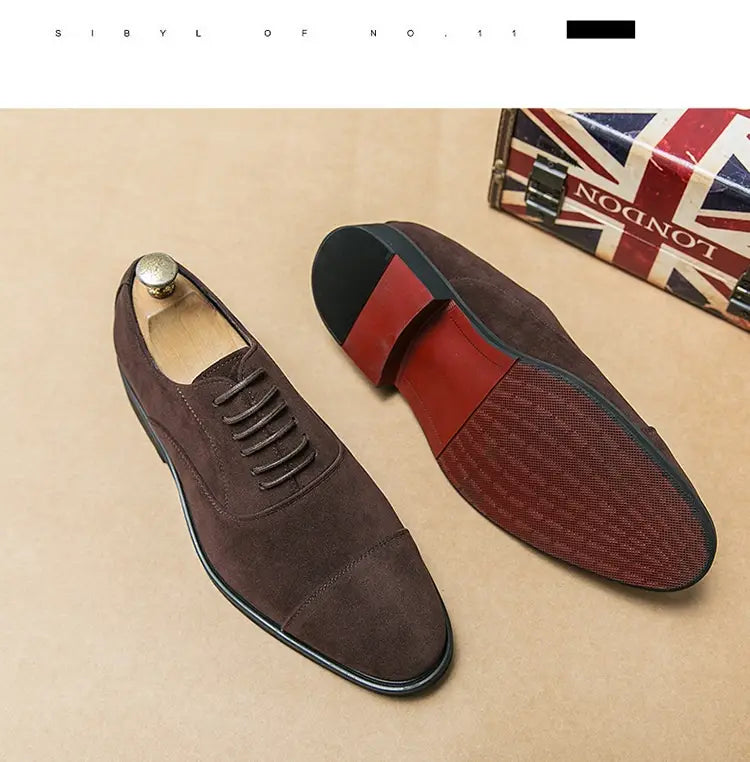 Modern suede business casual oxford shoes in black suede with cap toe lace-up design and stitched detailing.