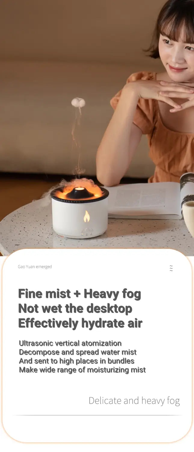 volcano flame diffuser jellyfish air humidifier white cylindrical body with black top and glowing orange mist emitting from its center