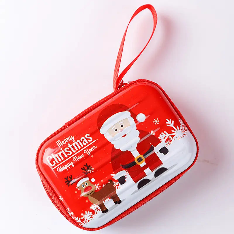 Red festive Christmas-themed tinplate zipper coin pouch featuring a cartoon Santa and reindeer design with snowflakes and white text reading merry Christmas happy new year on its glossy surface.