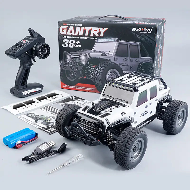 White and black 1:16 scale remote control high speed off-road jeep toy with rugged tires roof rack and detailed chassis.