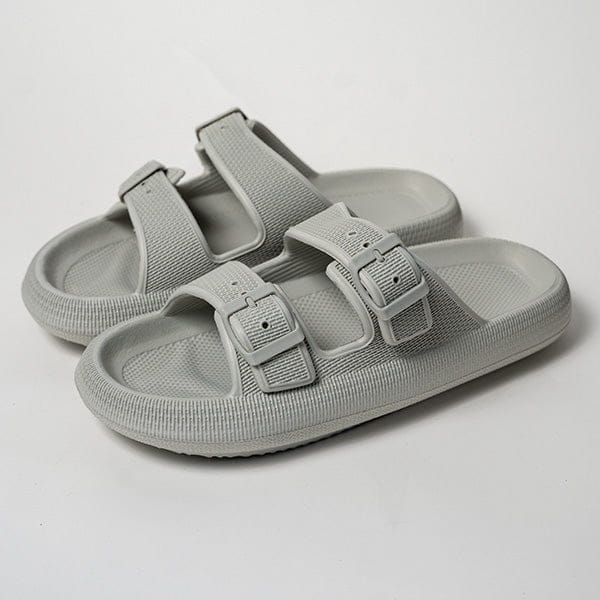 Black women’s dual-strap slide sandals with breathable textured fabric upper and thick sole eva rubber massage outsole