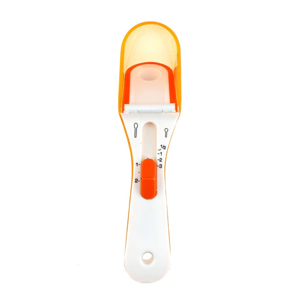 Adjustable measuring spoon set featuring an orange and white plastic spoon with a sliding indicator for precise measurements and a magnetic base.