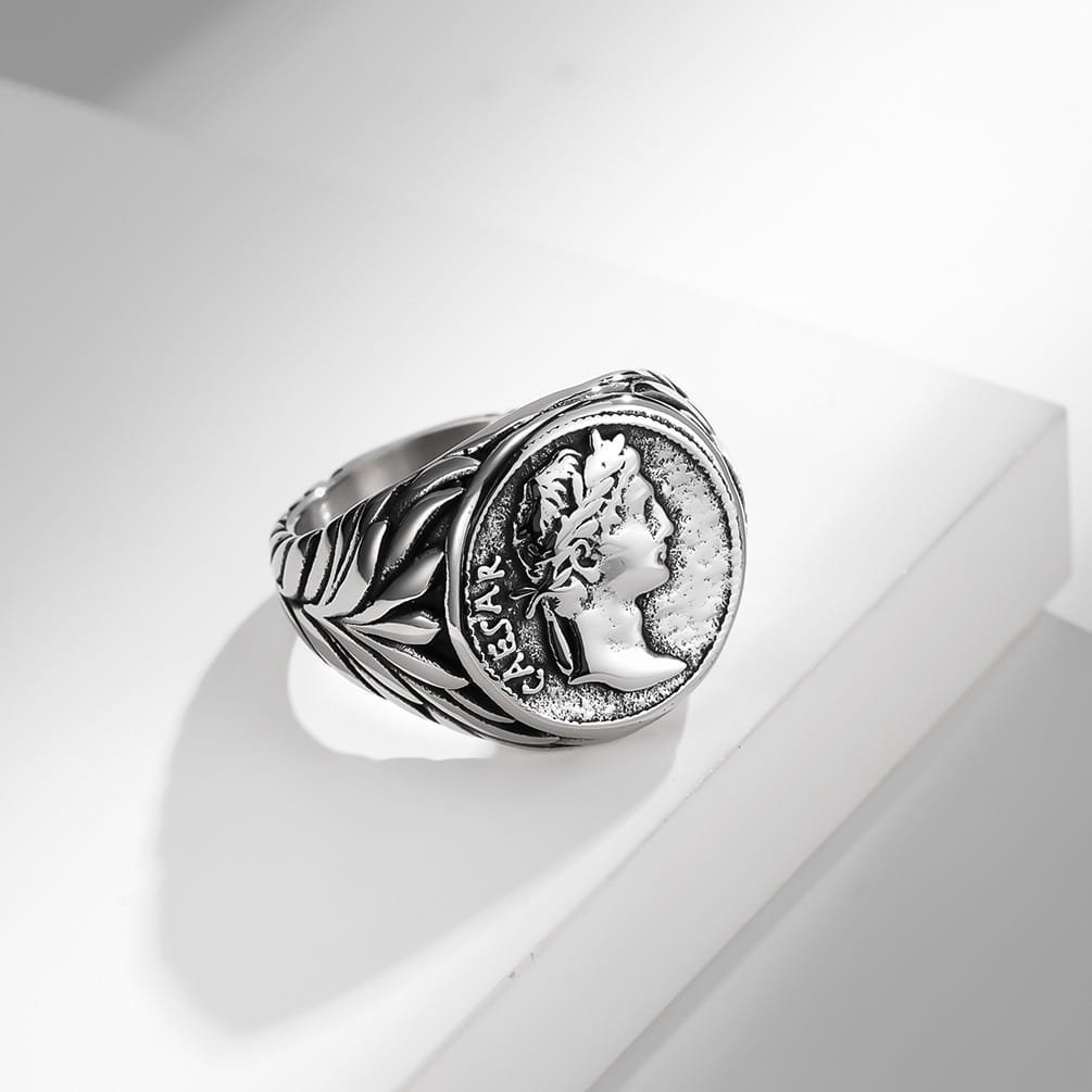Silver-toned vintage Caesar portrait stainless steel signet ring featuring a detailed Roman coin design with Caesar’s profile and laurel wreath set in an ornate band.