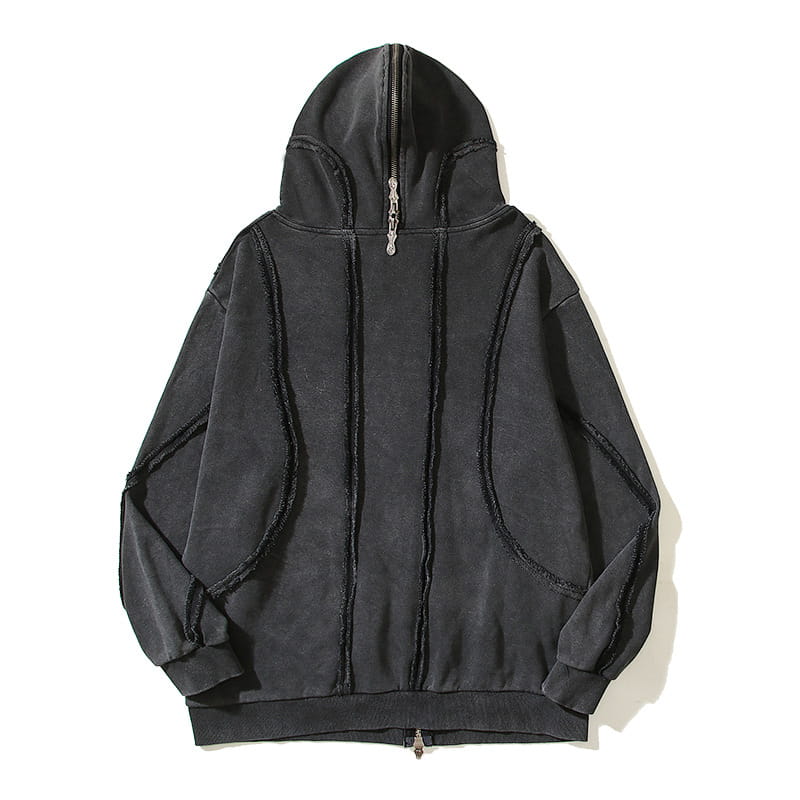Sudadera con cremallera y capucha estilo batik desgastado en color negro, con diseño de bordes sin rematar y detalles de cremallera plateada.