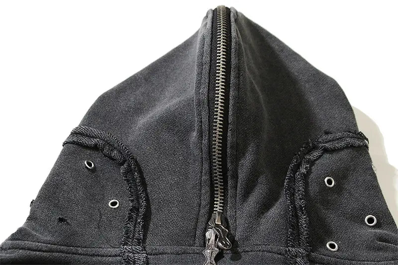 Cárdigan con capucha estilo batik desgastado en color negro, con cremallera plateada y ojales, elaborado con tela suave para uso casual
