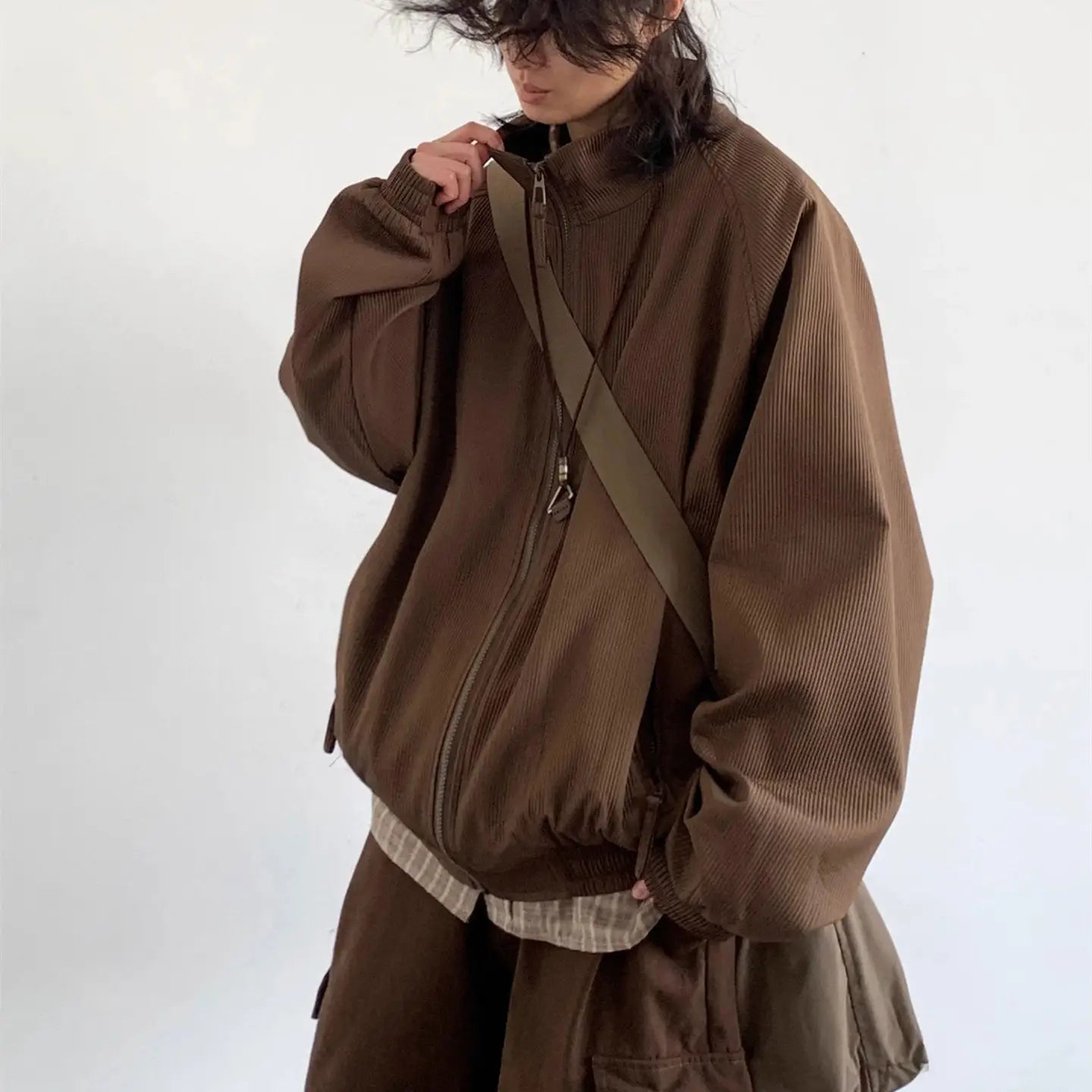 Brown corduroy bomber jacket with a full-length zipper and ribbed cuffs from the Corduroy Bomber Jacket Retro Loose Zipper Outerwear collection.