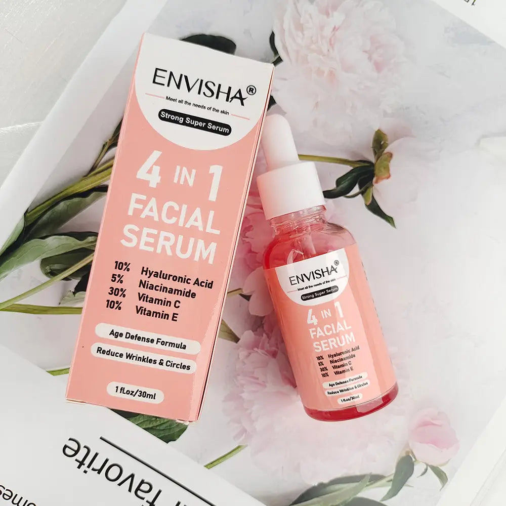 Pinkes envisha Anti-Aging-Gesichtsserum 4-in-1 Whitening-Esenz 30 ml in einer klaren Glasflasche mit weißem Pipettenaufsatz, neben passender rosa Verpackung.