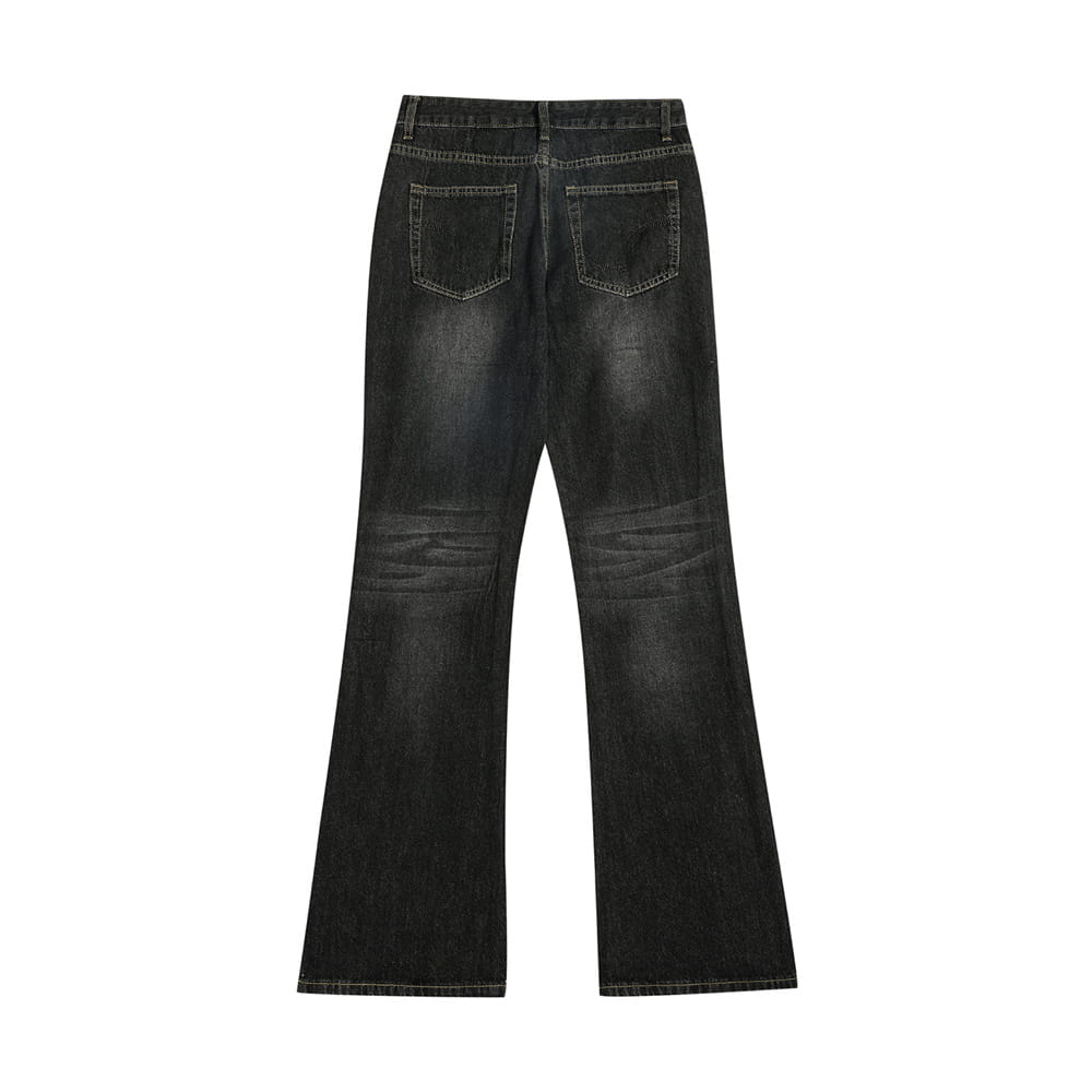 Vaqueros de mezclilla de algodón para hombre con campana desgastada y lavado oscuro, con deslavado sutil y detalles desgastados.