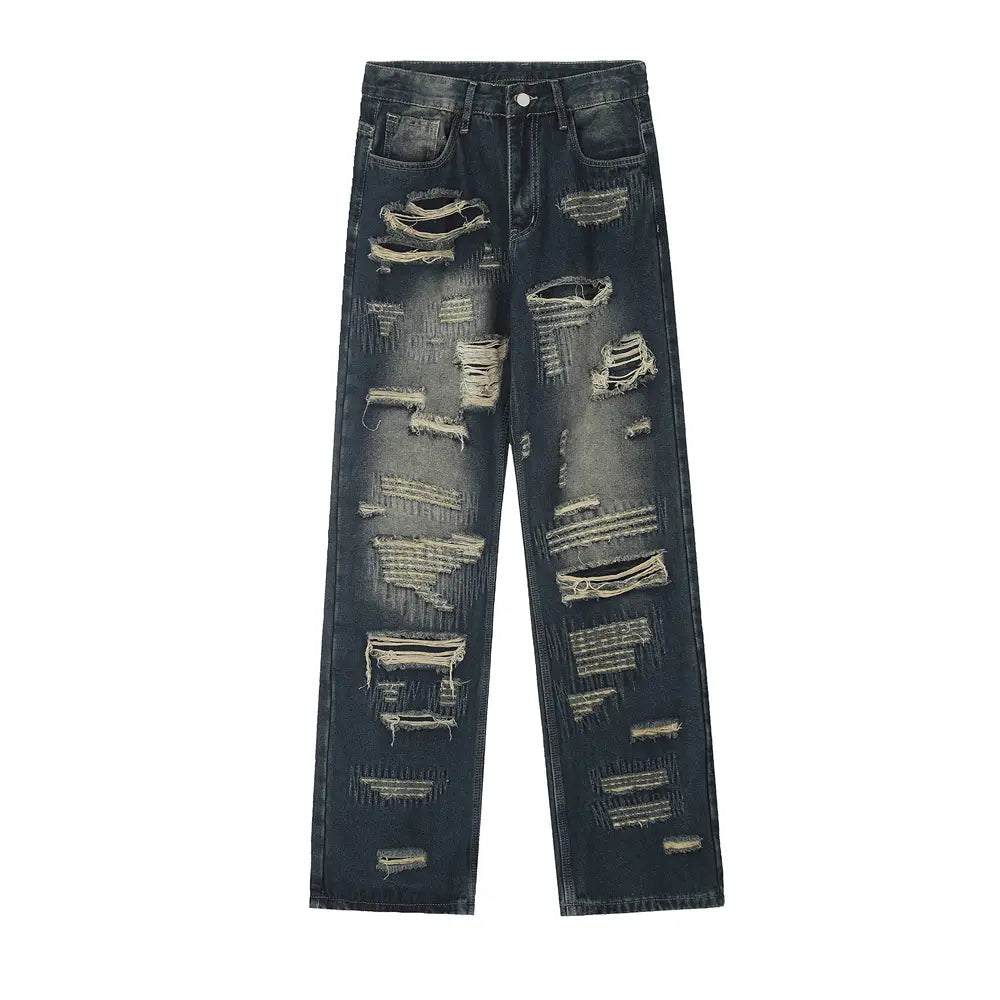 Jeans déchirés homme à effet usé, jambe droite, en denim, présentant un design déchiré à l’aspect usé avec des bords effilochés et des zones délavées.