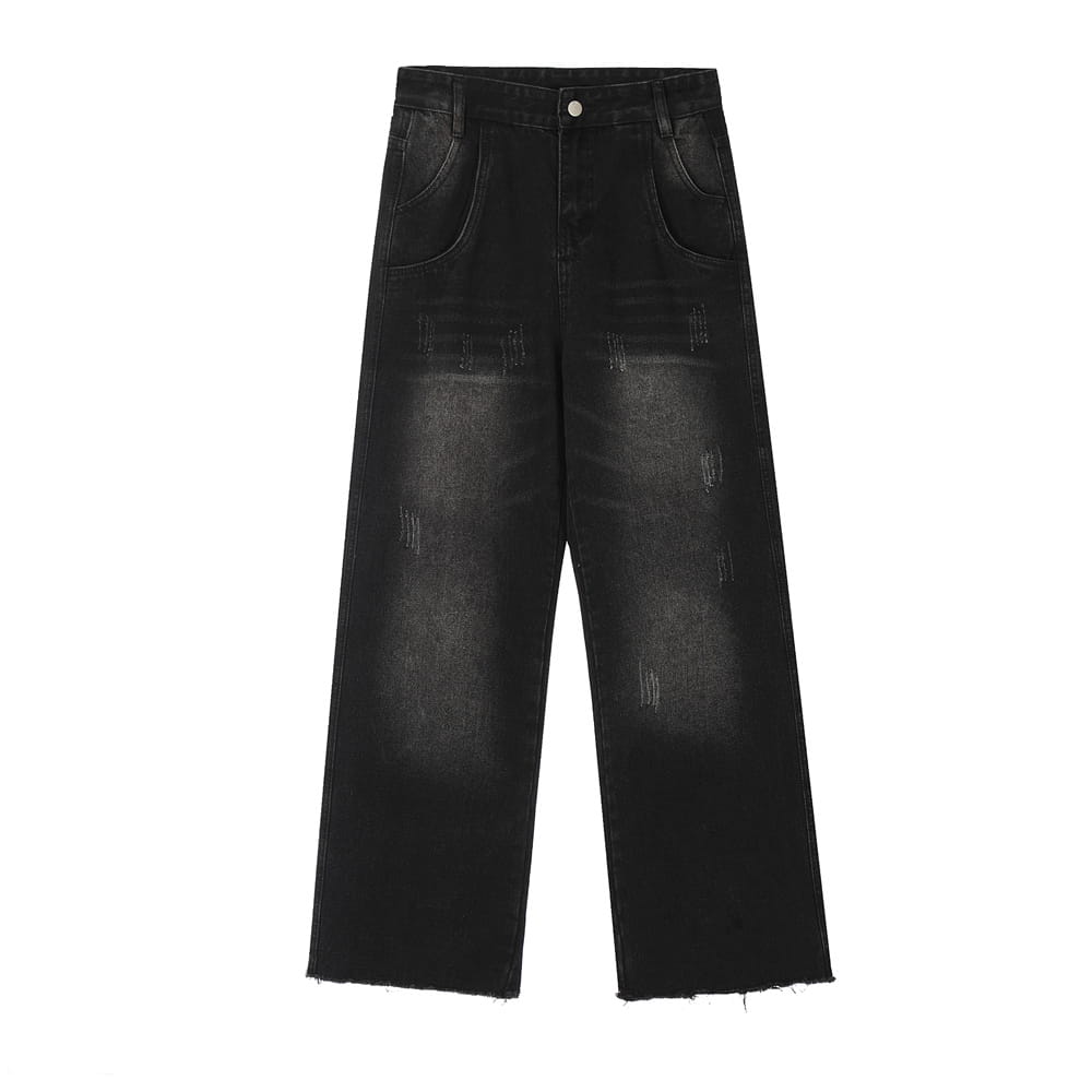 Vaqueros negros de mezclilla con pernera recta y estilo desgastado para hombre, con corte de pata ancha, detalles desgastados y dobladillos deshilachados.