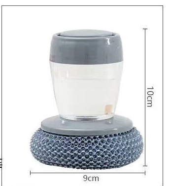 Distributeur de savon de cuisine en plastique gris, avec une base texturée à motif de motif alvéolé en forme de nid d’abeille et un corps cylindrique transparent, faisant partie d’un ensemble de brosse palmier distributeur de savon et de brosse à récurer.