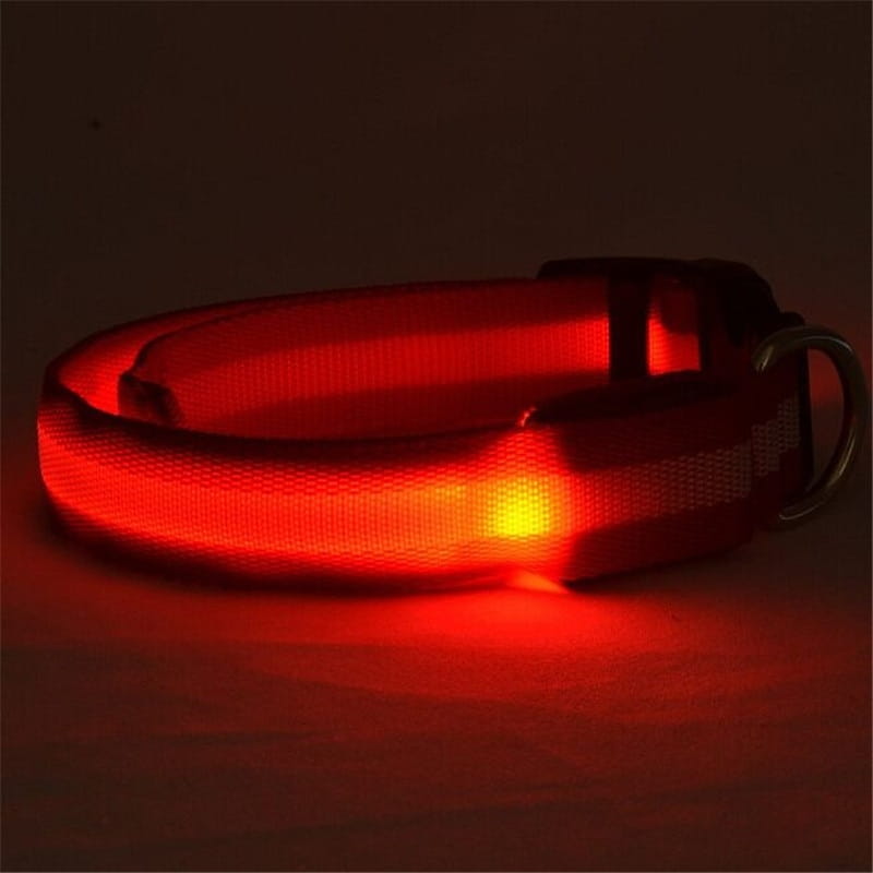 Red led dog collar with a glowing orange light and reflective strip made of nylon for night safety and visibility.