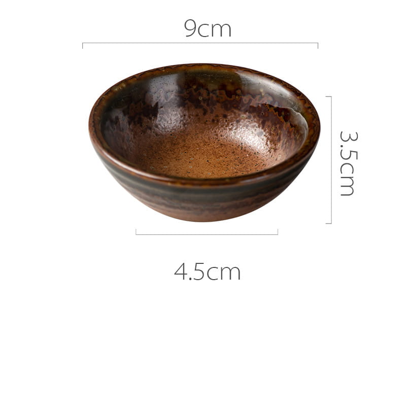 A rustic brown ceramic small plate featuring a glossy speckled glaze and handcrafted texture typical of Japanese ceramic craftsmanship.