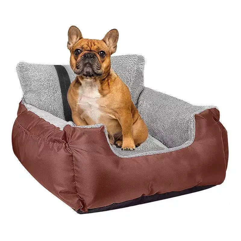 Brown and gray plush dog car seat with a cozy cushioned interior designed for small pets.