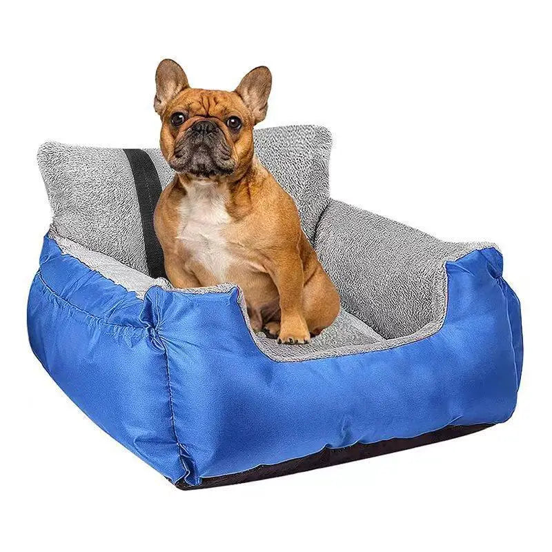 Plush dog car seat for small pets in gray features a blue and gray plush dog bed with a cozy cushioned interior.