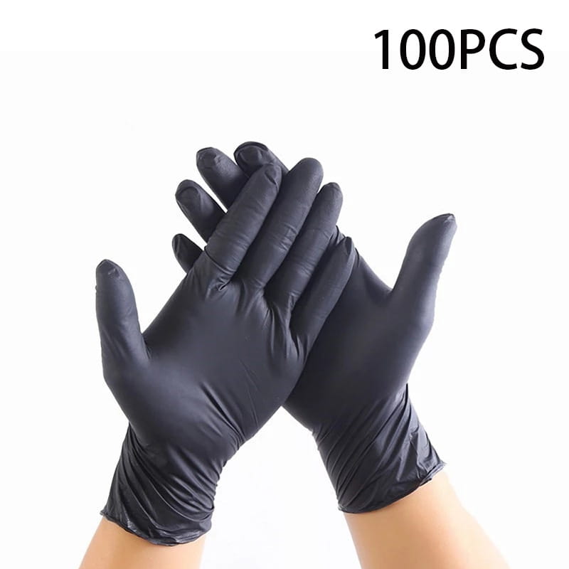 A pair of hands wearing black nitrile disposable protective gloves from a 100 pack.