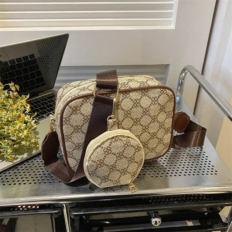 Beige and brown patterned vintage monogram shell crossbody bag with matching circular coin pouch.