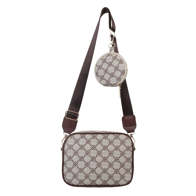 Beige and brown patterned vintage monogram shell crossbody bag with a matching circular coin pouch attached to the strap.