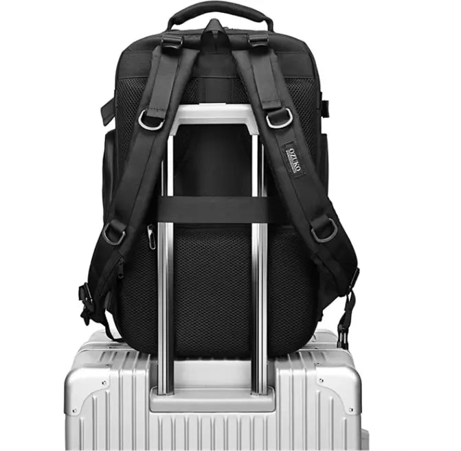 Black mesh and nylon tactical waterproof laptop backpack with adjustable straps and sizano branding on the strap shown from the back side.