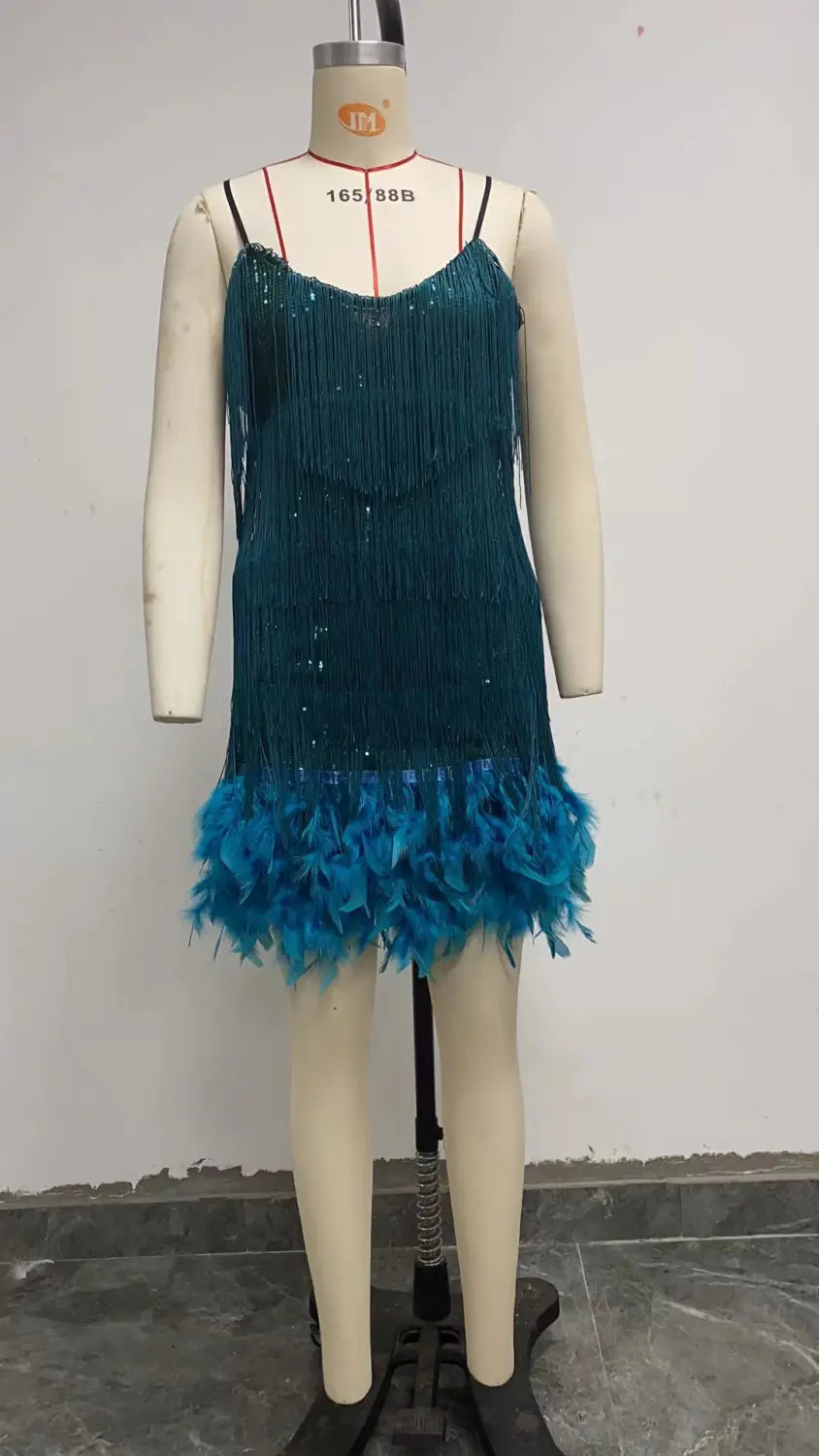 Teal sequined and feathered party mini dress with a v neck and black spaghetti straps.