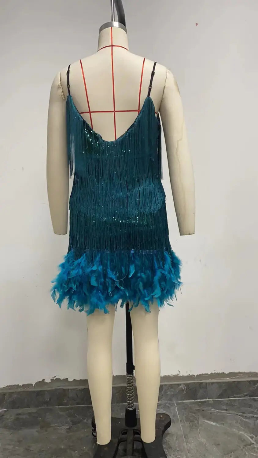 Teal sequin feather tassel v neck party mini dress with thin straps and feather detailing.