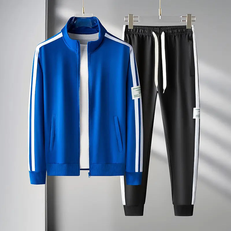 men track suit zip two piece set green featuring a vibrant royal blue jacket with bold white vertical stripes and matching black joggers with white side panels