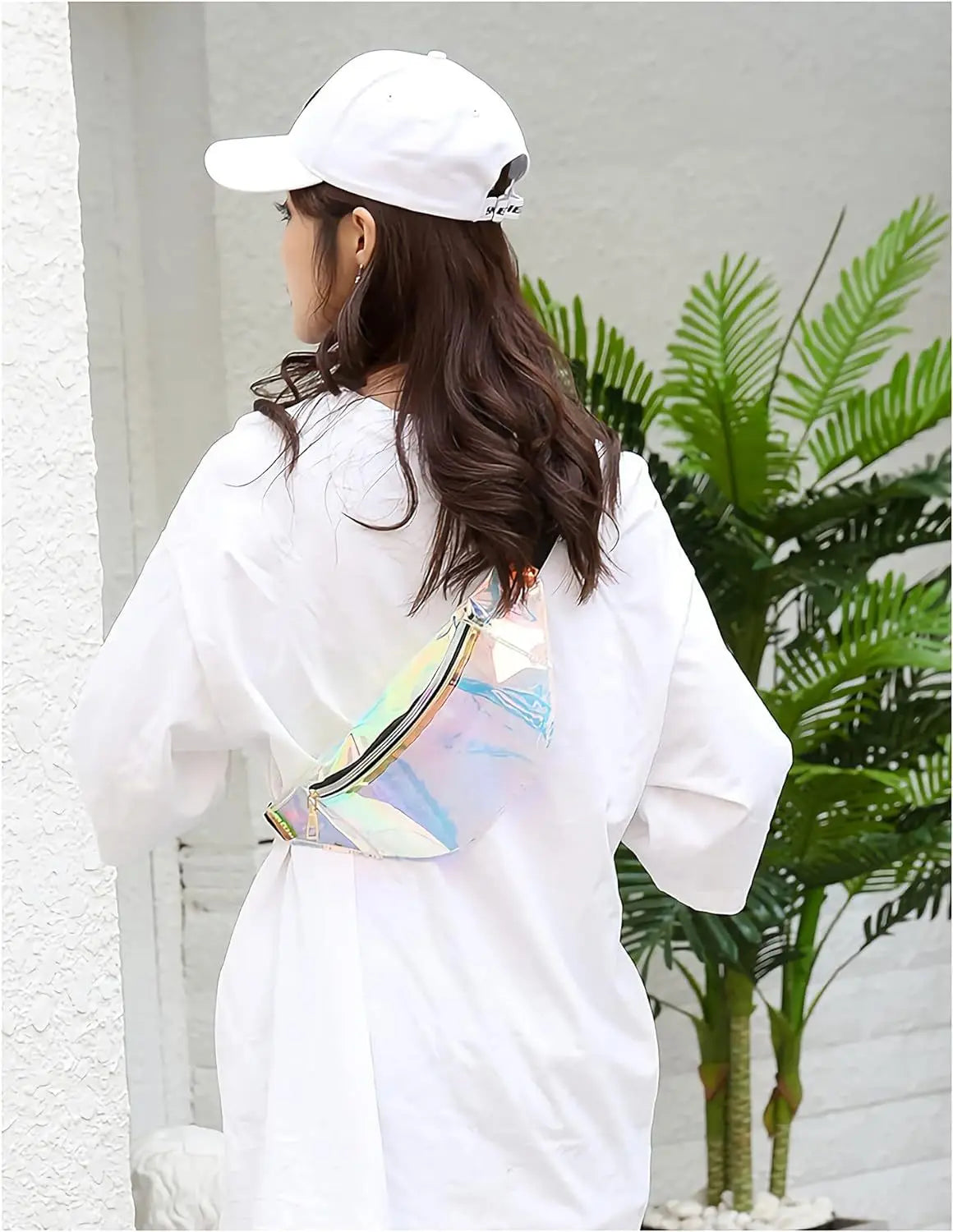 Holographic iridescent TPU waist bag chest satchel with a sleek modern design and reflective zipper.