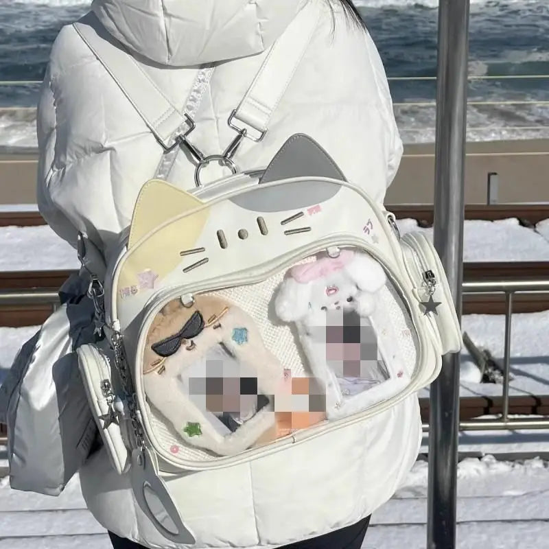 White cat-shaped messenger bag crossbody bag with clear ita panel pocket and gray ears.