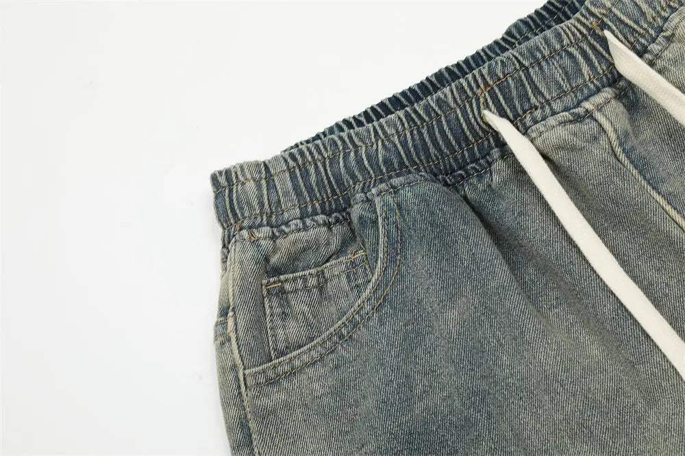 Shorts en jean pour hommes à bretelles diagonales, gris, coupe décontractée, taille élastique et cordons blancs contrastants