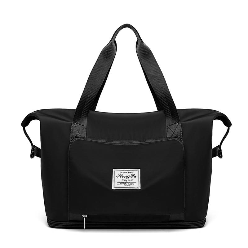 Black nylon foldable gym bag waterproof travel duffel with reinforced handles and a branded patch on the front featuring a shoe pocket.