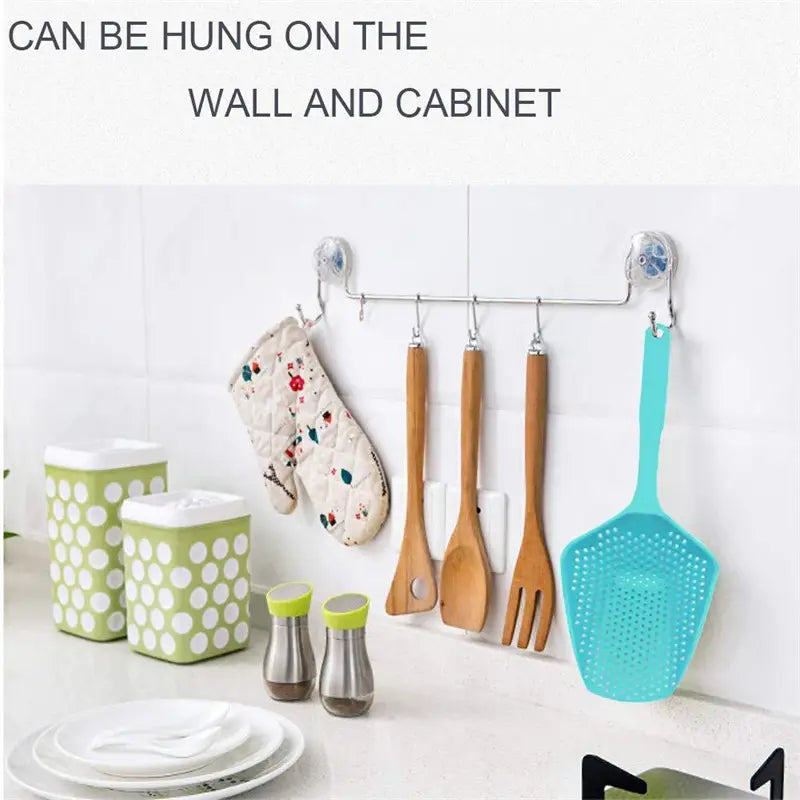 Silver metal wall-mounted kitchen utensil rack with suction cups designed to hold nylon strainer scoop colanders for cooking and draining.