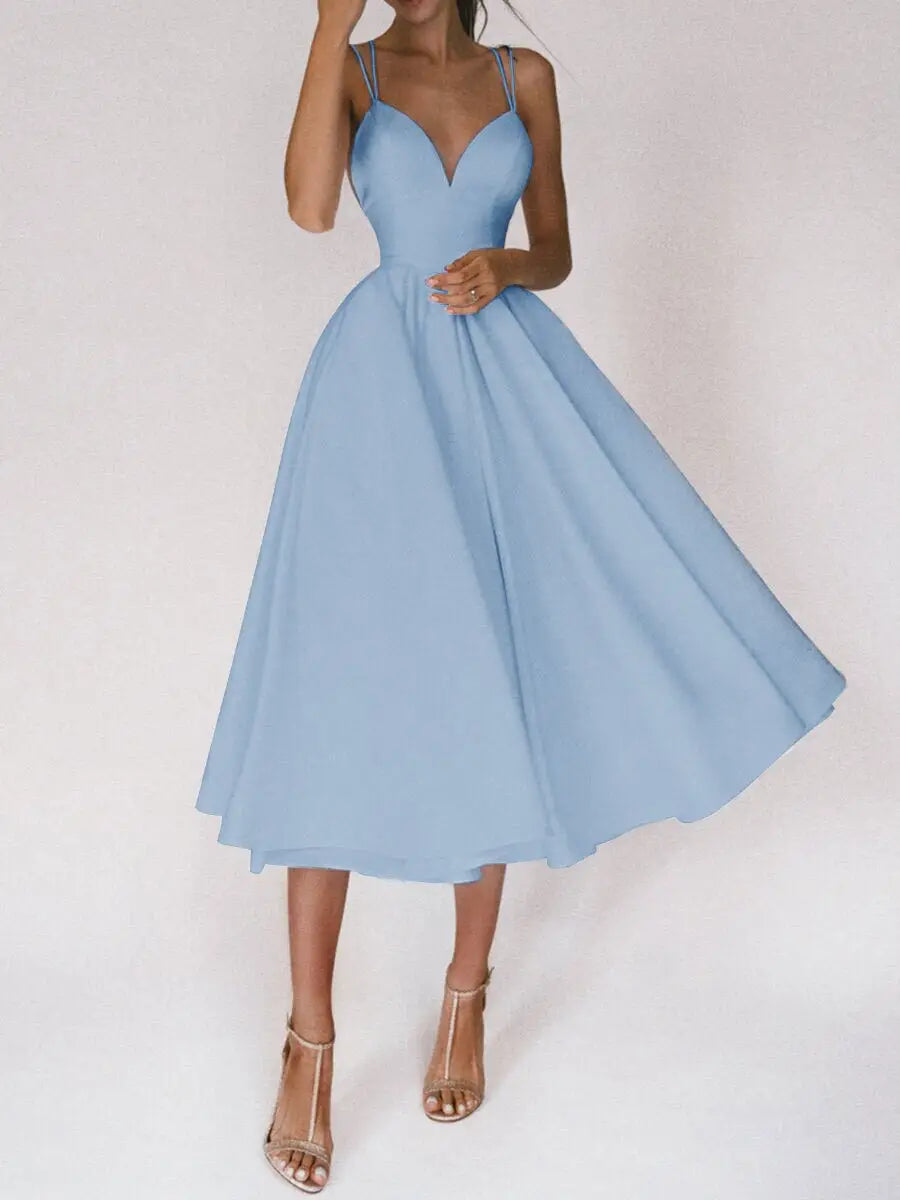A light blue satin v neck a line midi dress with thin spaghetti straps and a fitted bodice.