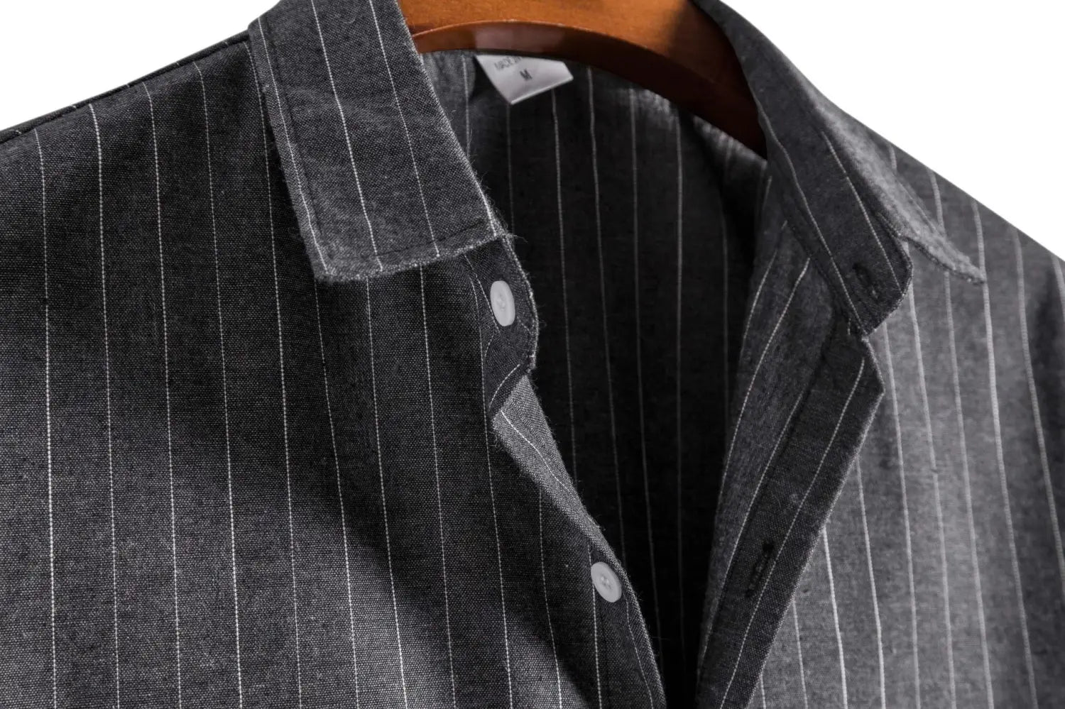 Men’s slim fit short sleeve button up shirt in dark gray with subtle white pinstripe vertical lines and a classic collar.