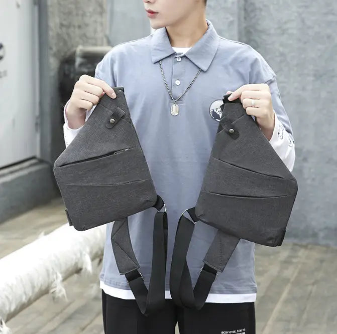 Black textured fabric men’s waterproof anti-theft multifunctional crossbody bag with adjustable straps and front pocket.