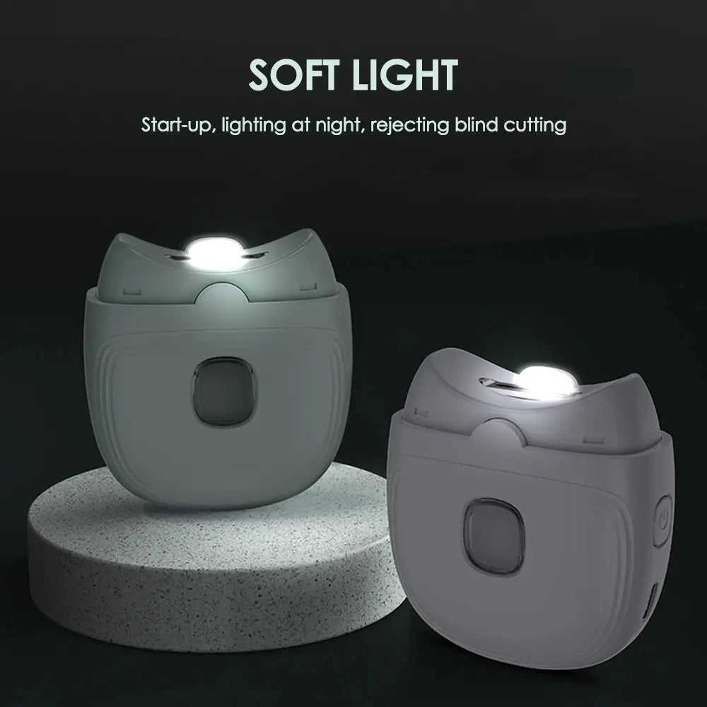 White plastic electric nail clippers rechargeable automatic trimmer with a soft LED light on top for precise grooming.
