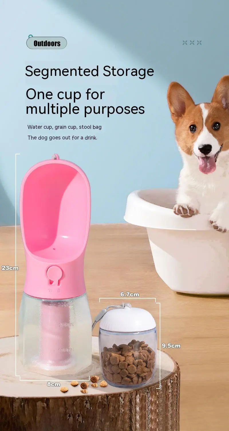 Pink and transparent segmented pet water cup with built-in straw made of durable plastic for outdoor use from the 3-in-1 portable dog water bottle and food dispenser.