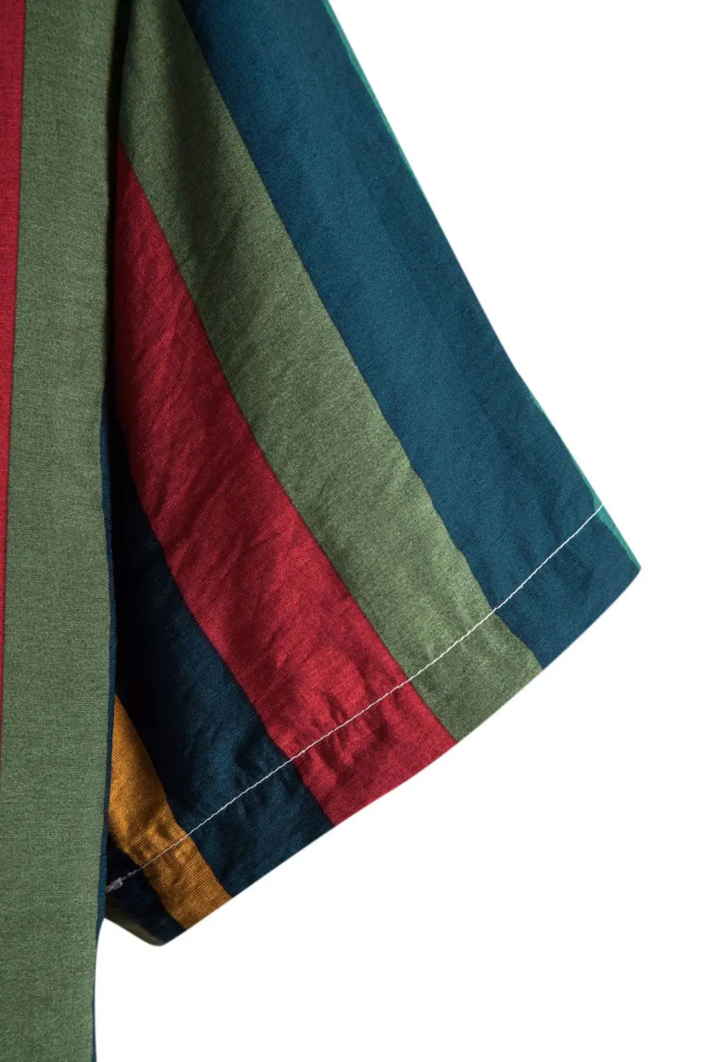 A vibrant striped short sleeve button up shirt sleeve featuring bold vertical bands of green red teal and gold.