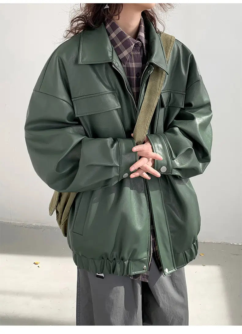 Olive green faux leather loose jacket with a relaxed oversized fit and front zipper closure suitable for casual spring and autumn wear.
