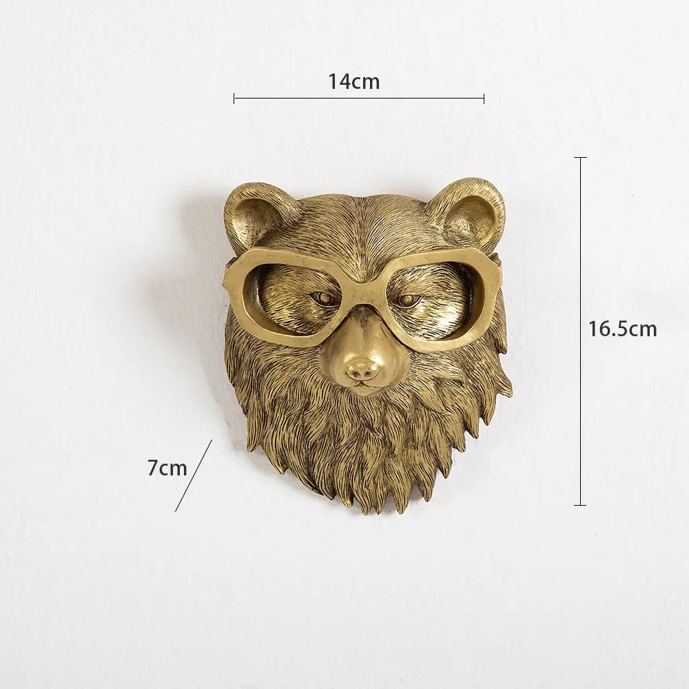 Gold-colored brass resin bear head wall decor featuring textured fur and glasses in an animal head wall decor collection.