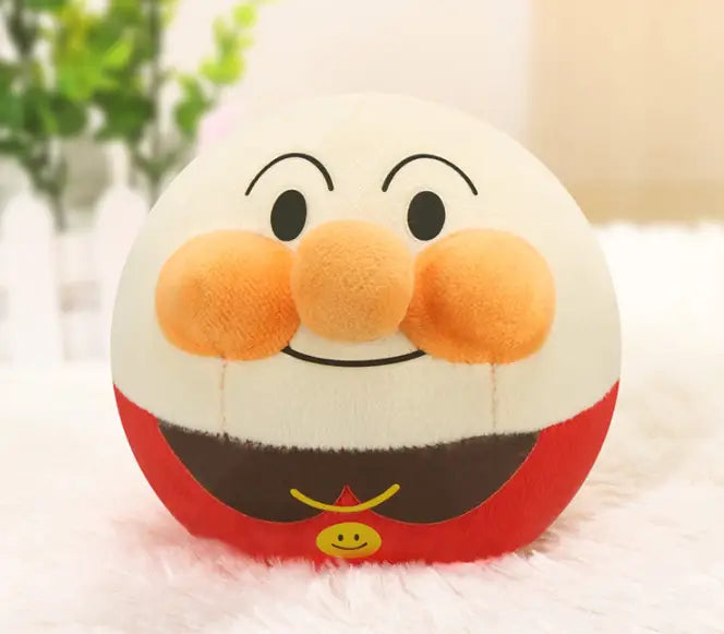 Plush jumping ball interactive talking bunny toy featuring a white and red plush body with an orange nose, black eyes, smiling mouth, and a small yellow smiley face on its chest.