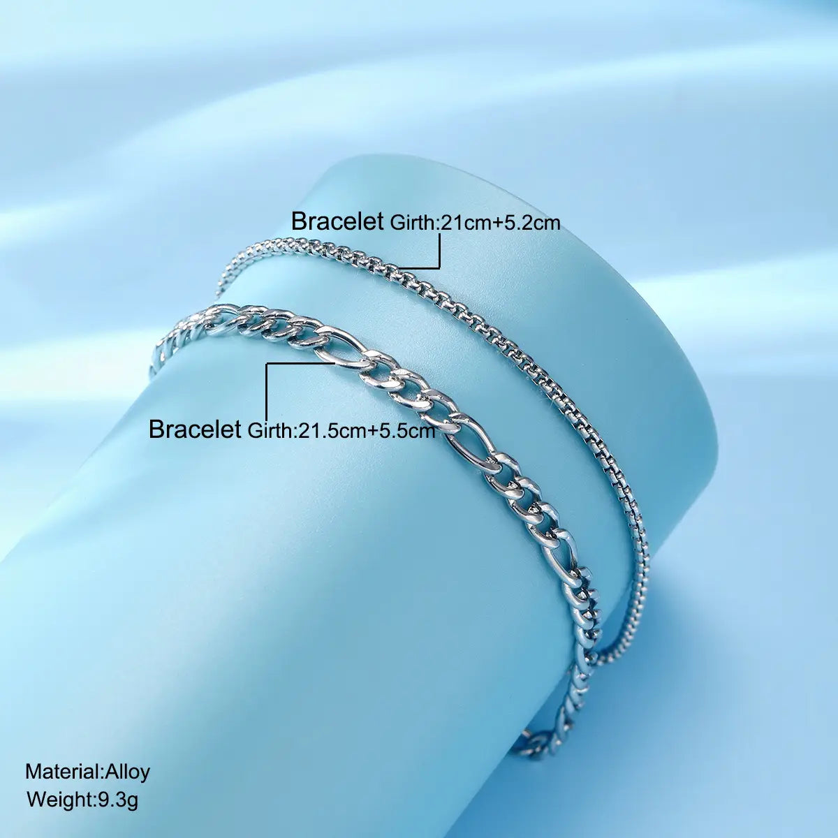 unisex silver layered cuban and figaro link bracelet set featuring silver-toned alloy chain bracelets with classic figaro link and sleek box chain designs.
